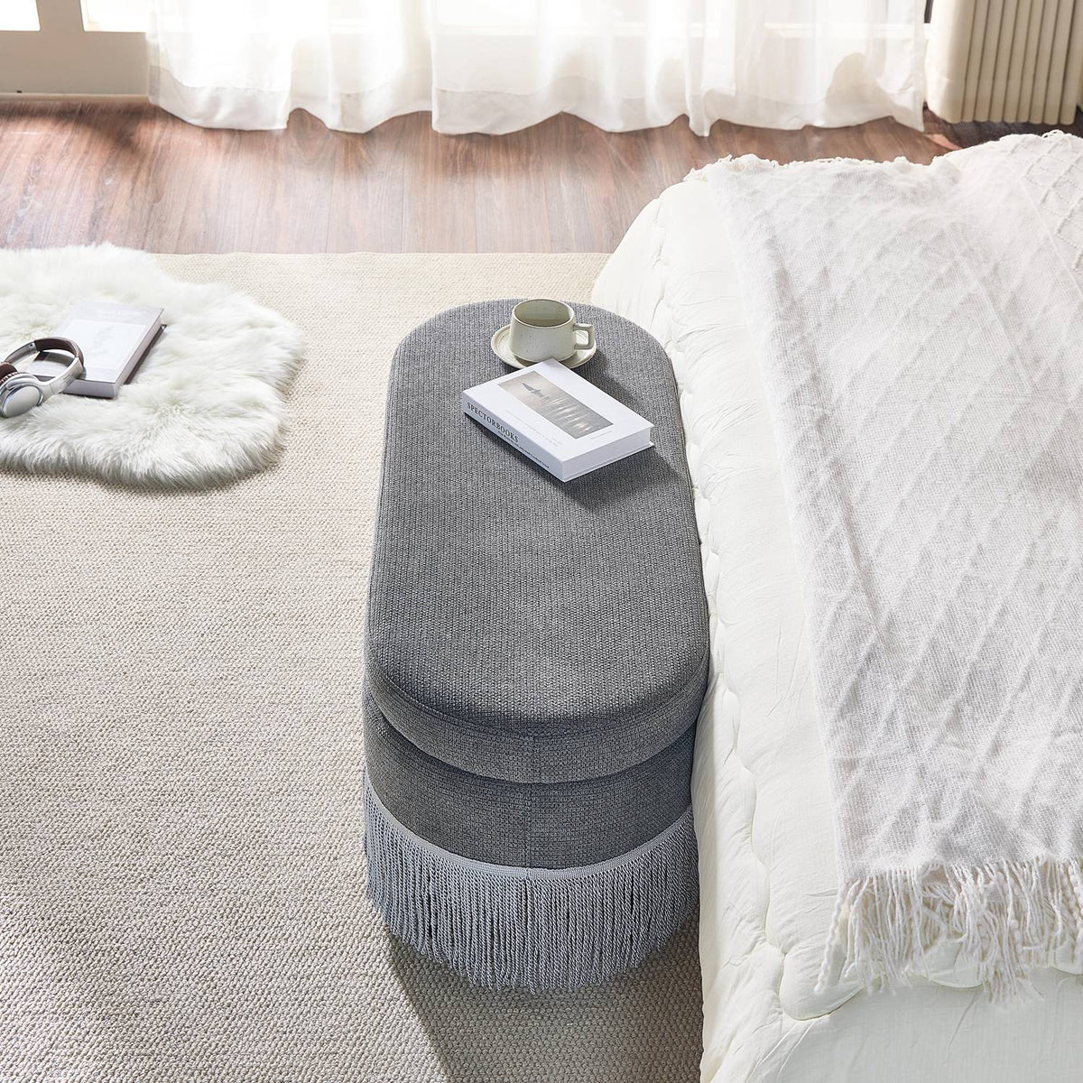 Oval Upholstered Storage Ottoman with Fringe Trim, 39.4"