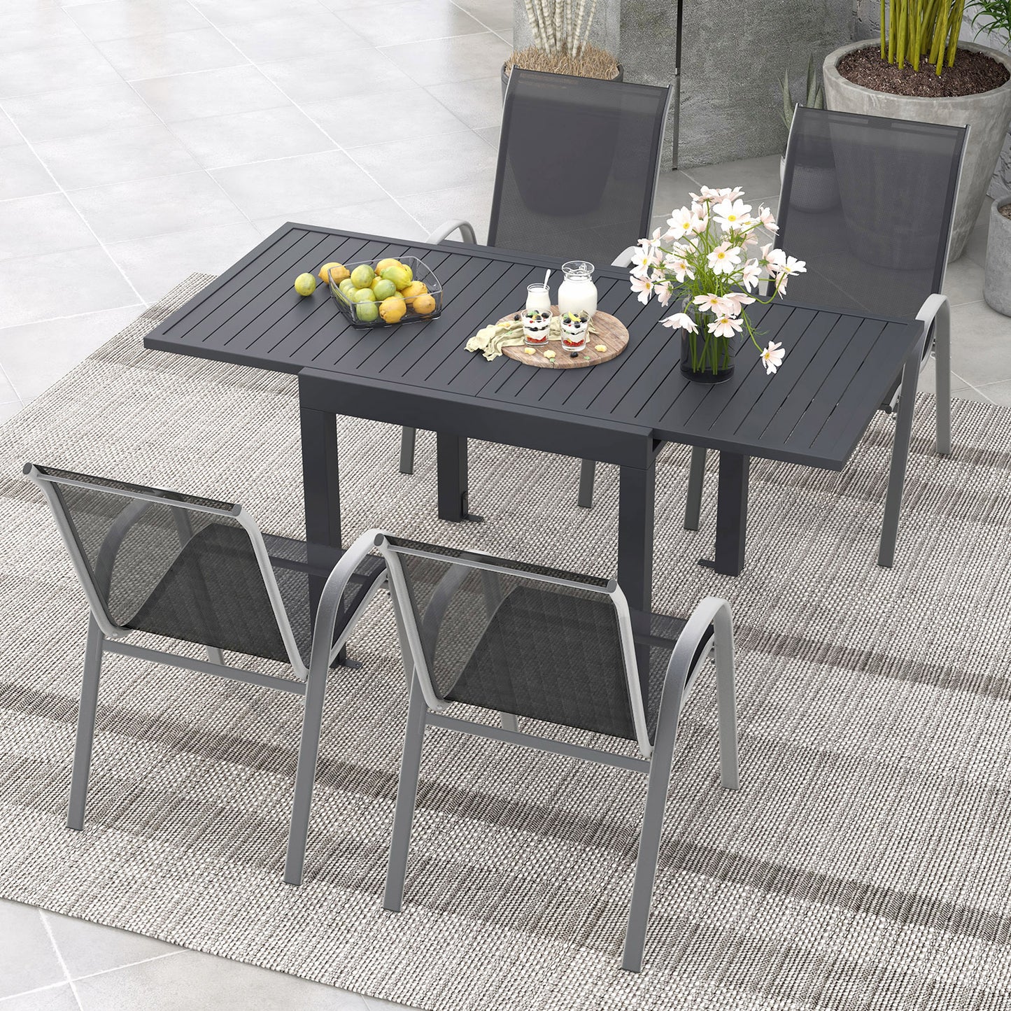 Extendable Patio Dining Set with 4 Stackable Chairs